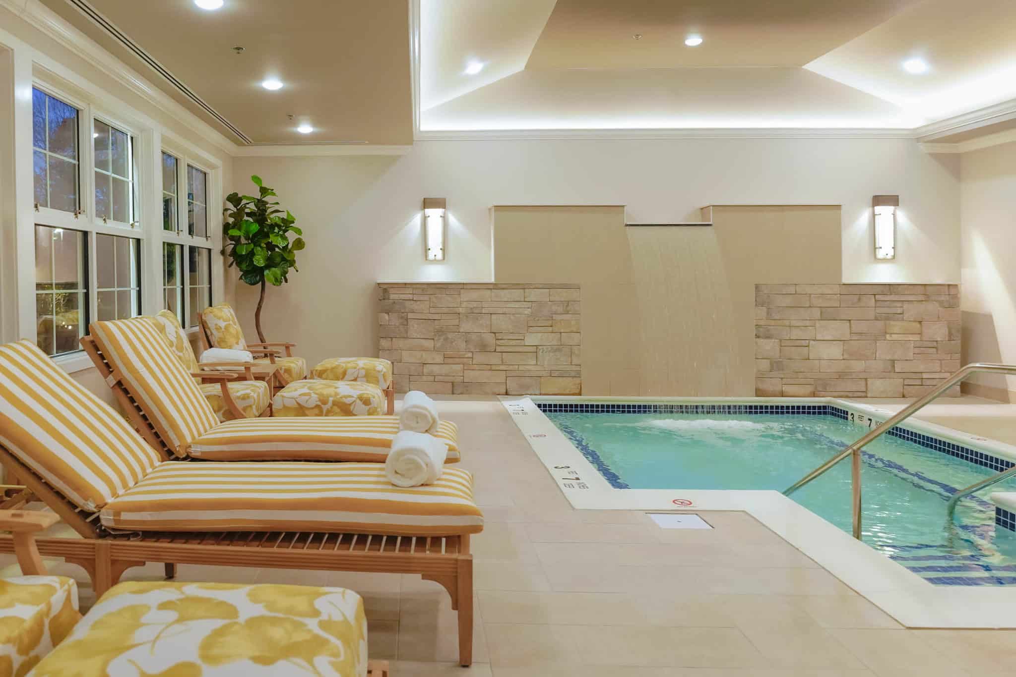 addiction treatment center campus Serenity pool with soothing waterfall