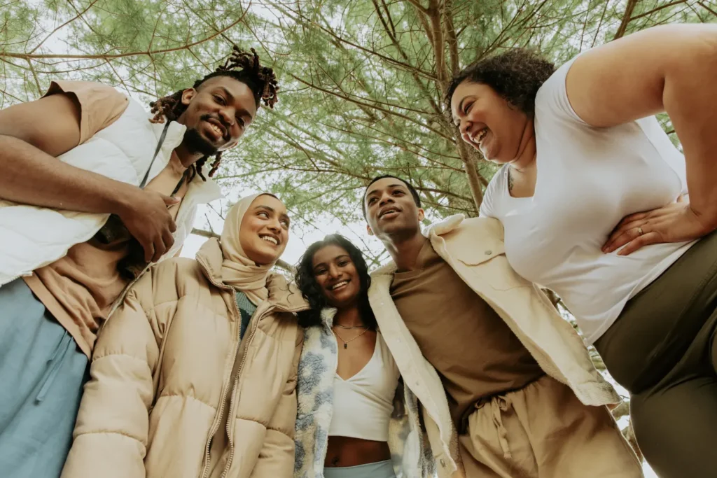 a diverse group of people out in nature