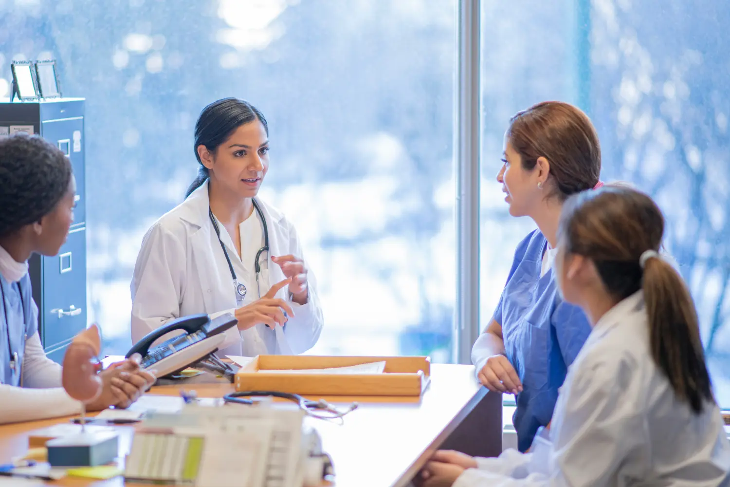 a group of medical professionals having a meeting