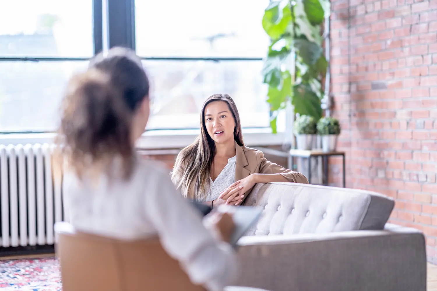 a therapist and her patient engaged in a session