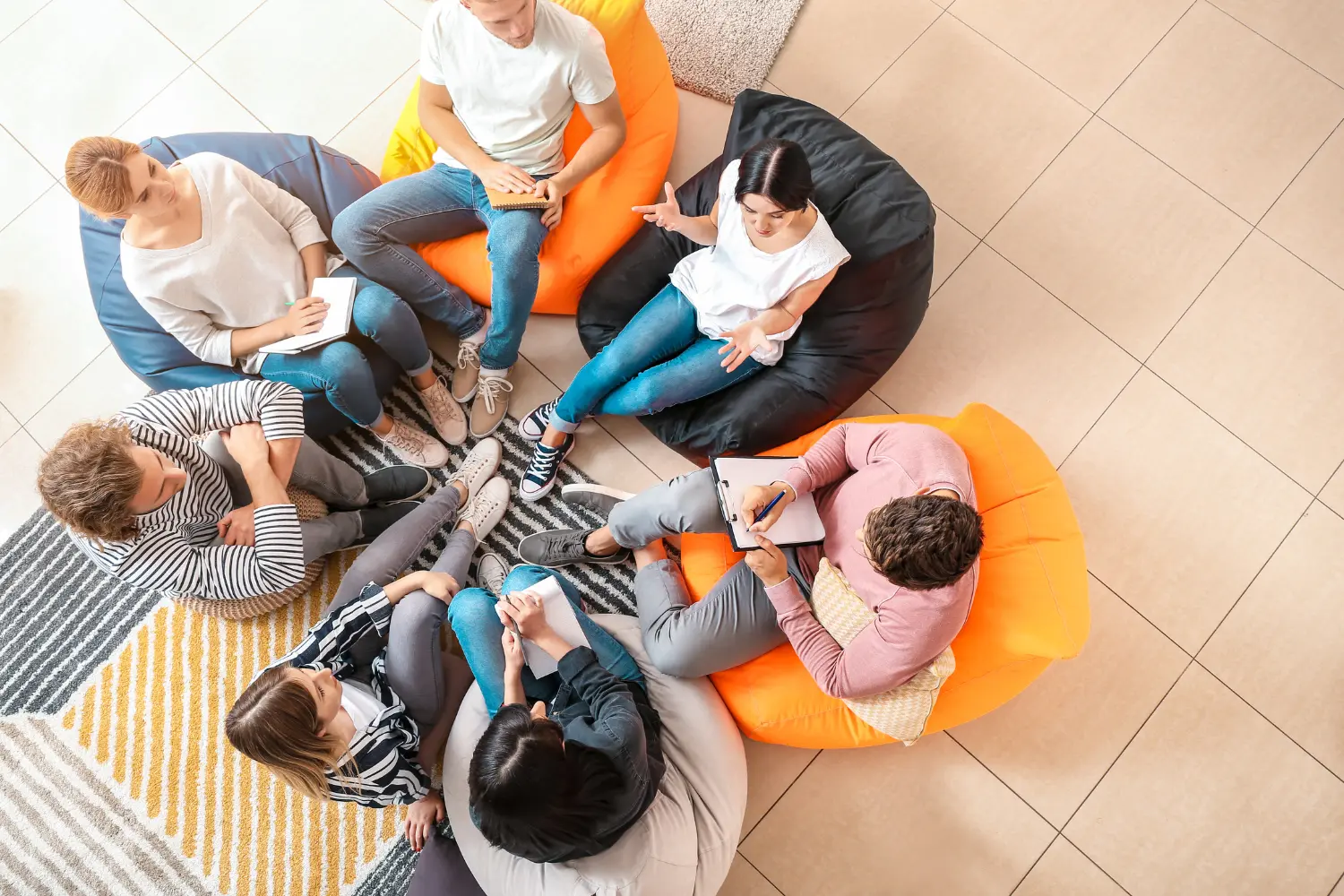 a top down view of a group therapy circle