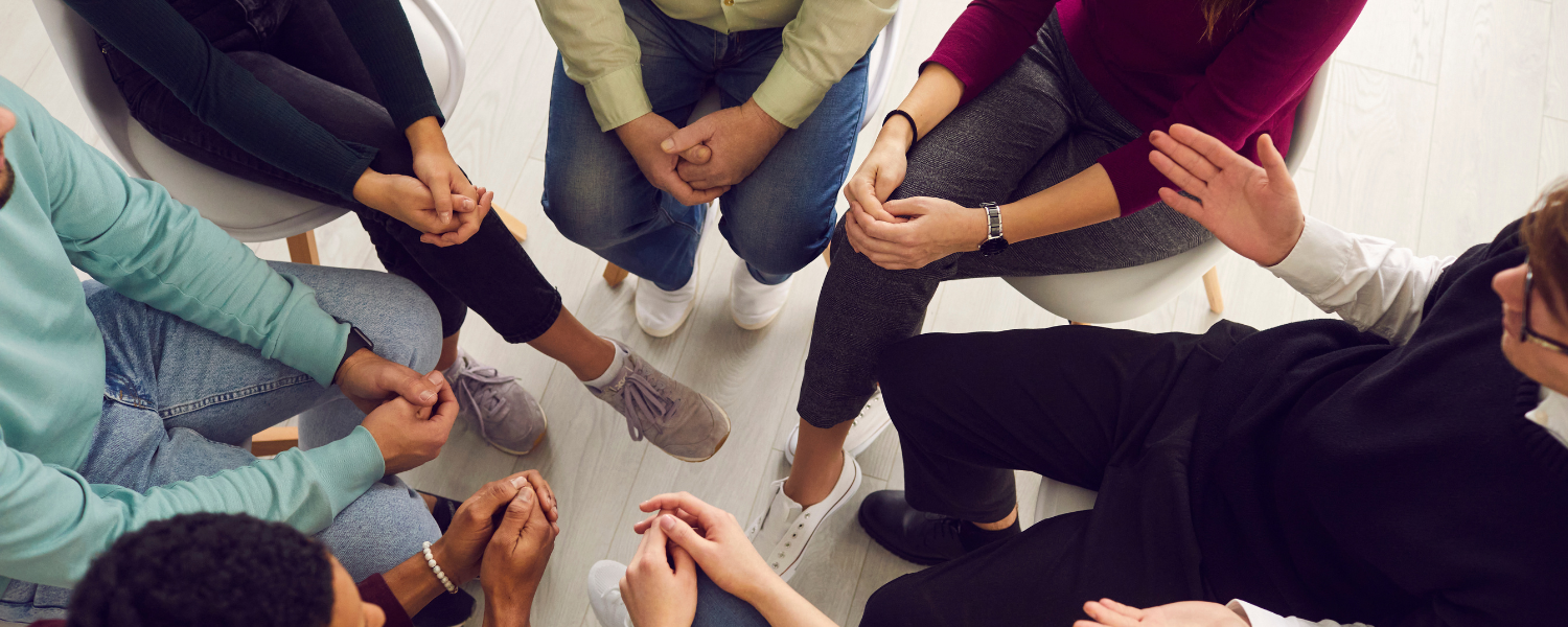 top down view of a close knit group therapy circle